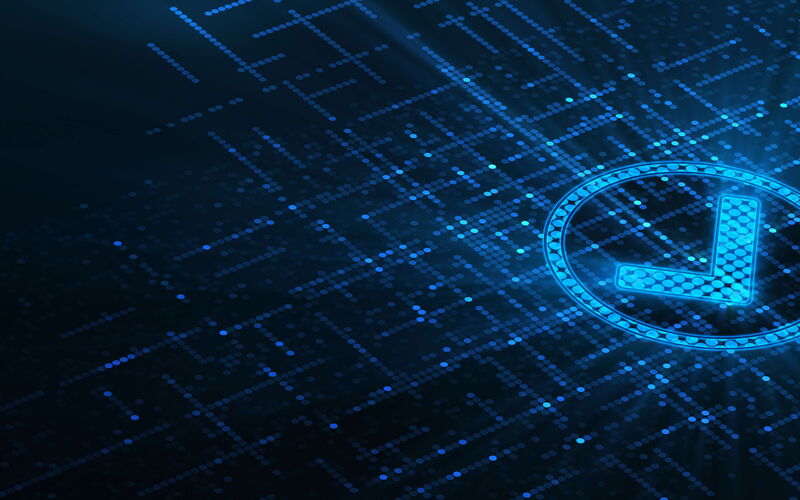 A Check mark in front of a particle style background.
